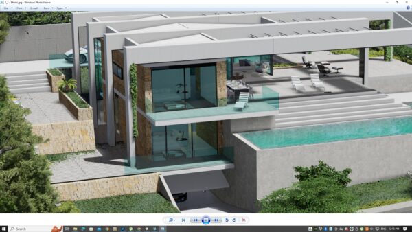 casa con tumbonas y piscina